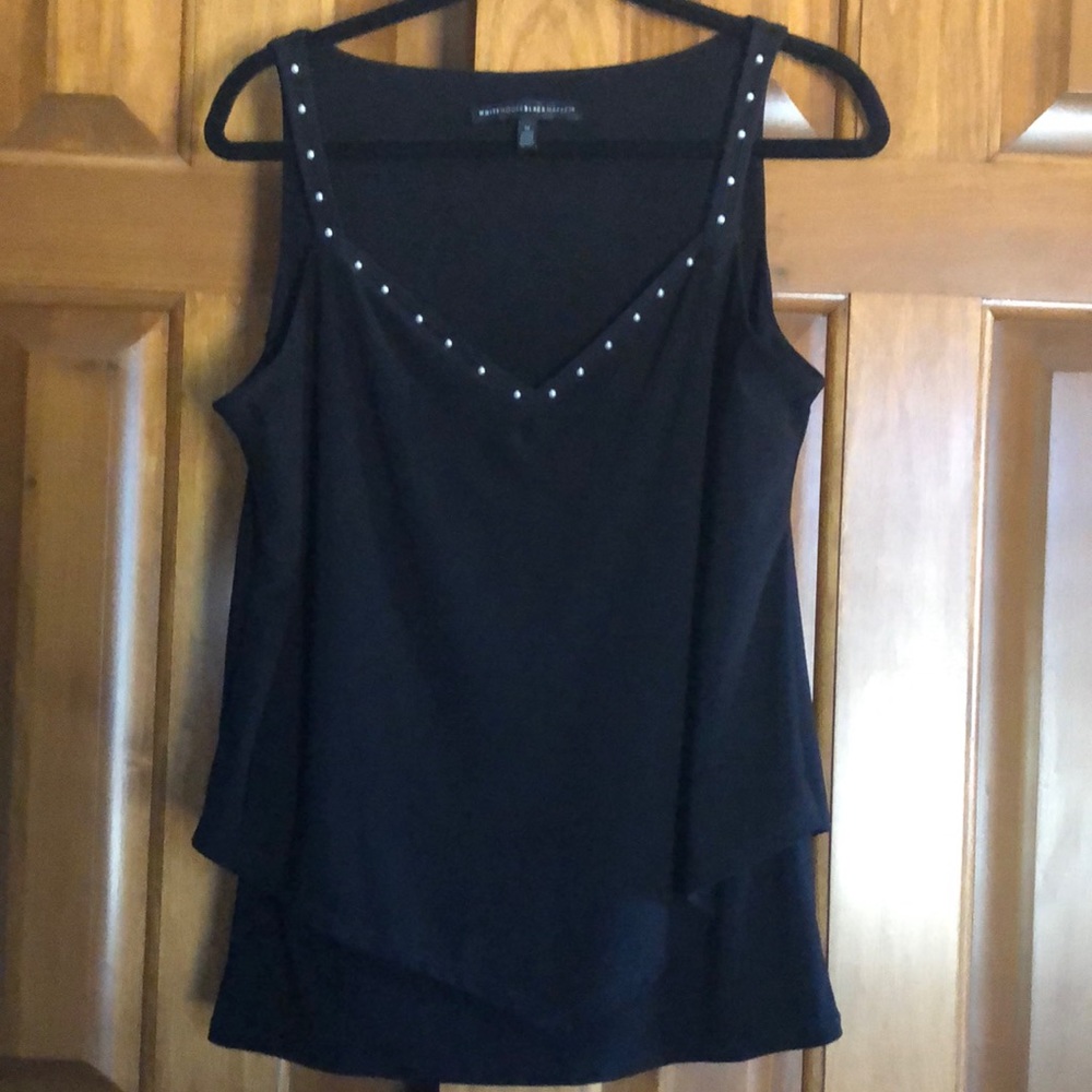Very flattering double layer black top with pearl accents around v-neck straps.
